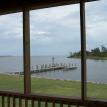 looking out front porch of waterfront lodge